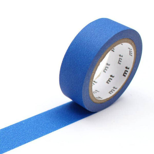Blue tape with a white label on a white background