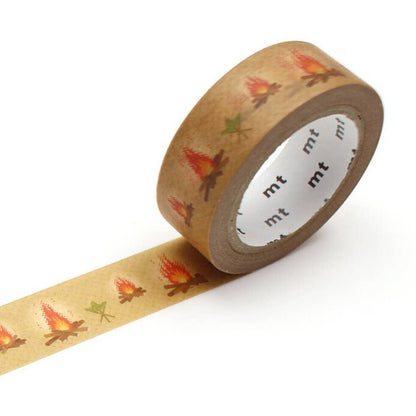 Roll of decorative tape with campfire design on a white background