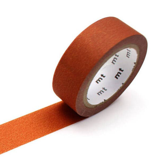 Orange tape with 'mt' branding on a white background