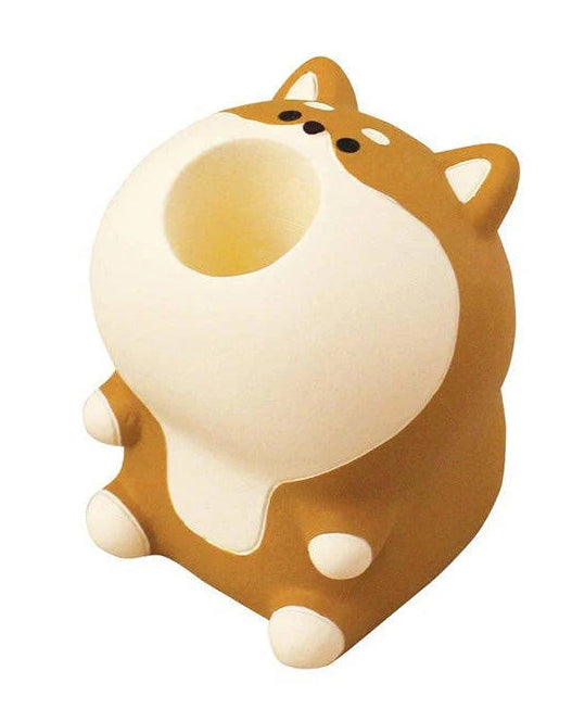 Cute dog-shaped object on a white background
